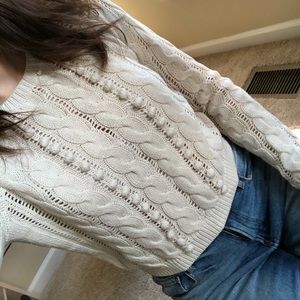 sweater with ball details